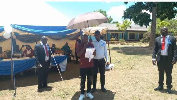 Madzibaba Benji gives a speech at  Howson Primary School